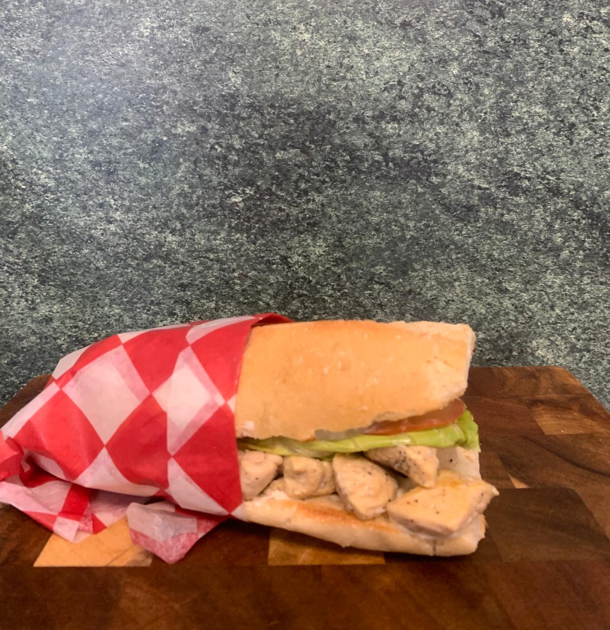 Fresh Chicken Sub Sandwich On Wooden Board